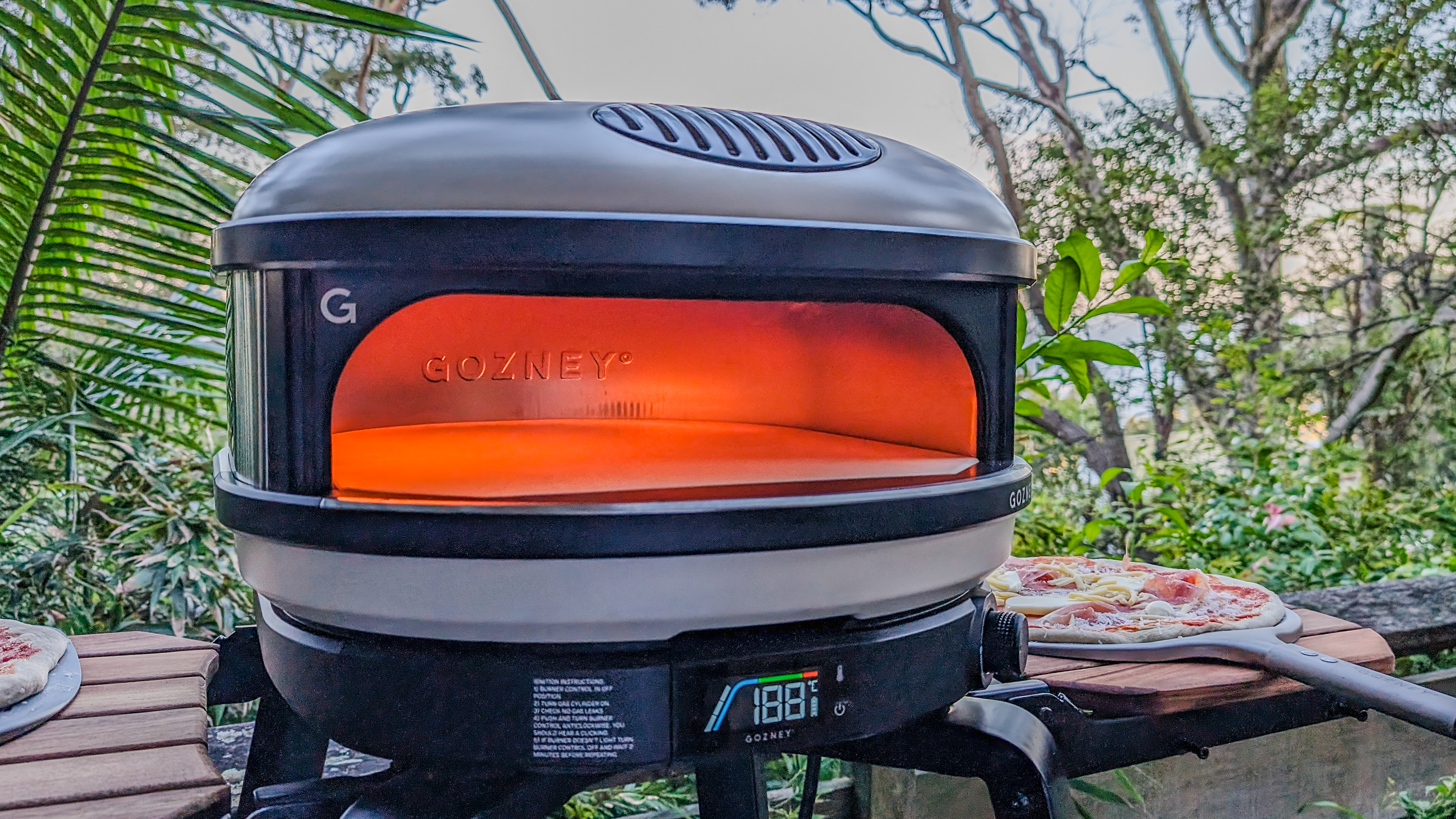 Gozney Arc XL pizza oven fired up on its stand