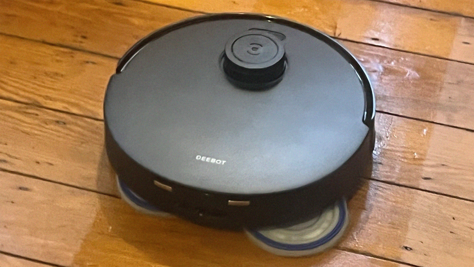 Ecovacs Deebot T30 S Combo robot vacuum on a hardwood floor