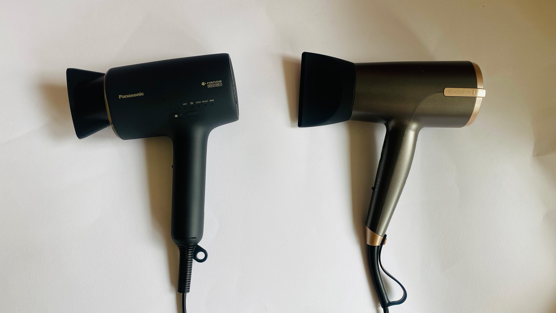 Remington One Dry & Style Hair Dryer next to Panasonic Panasonic Nanoe Moisture+ and Mineral hair dryer