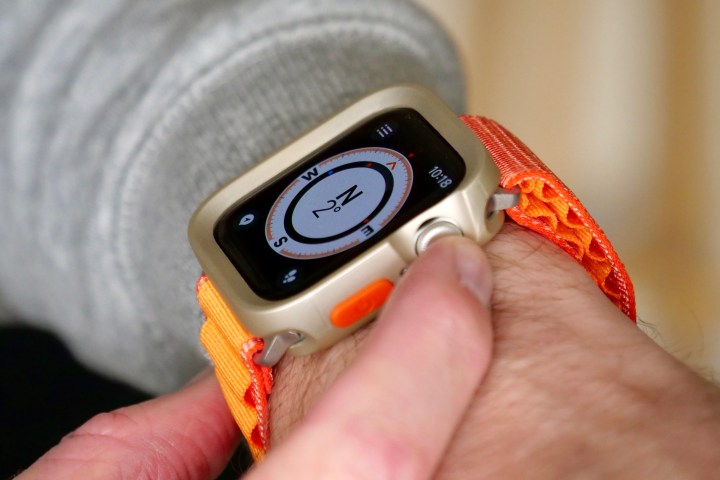 Apple Watch SE 2 with protective case and generic Alpine Loop-style strap.