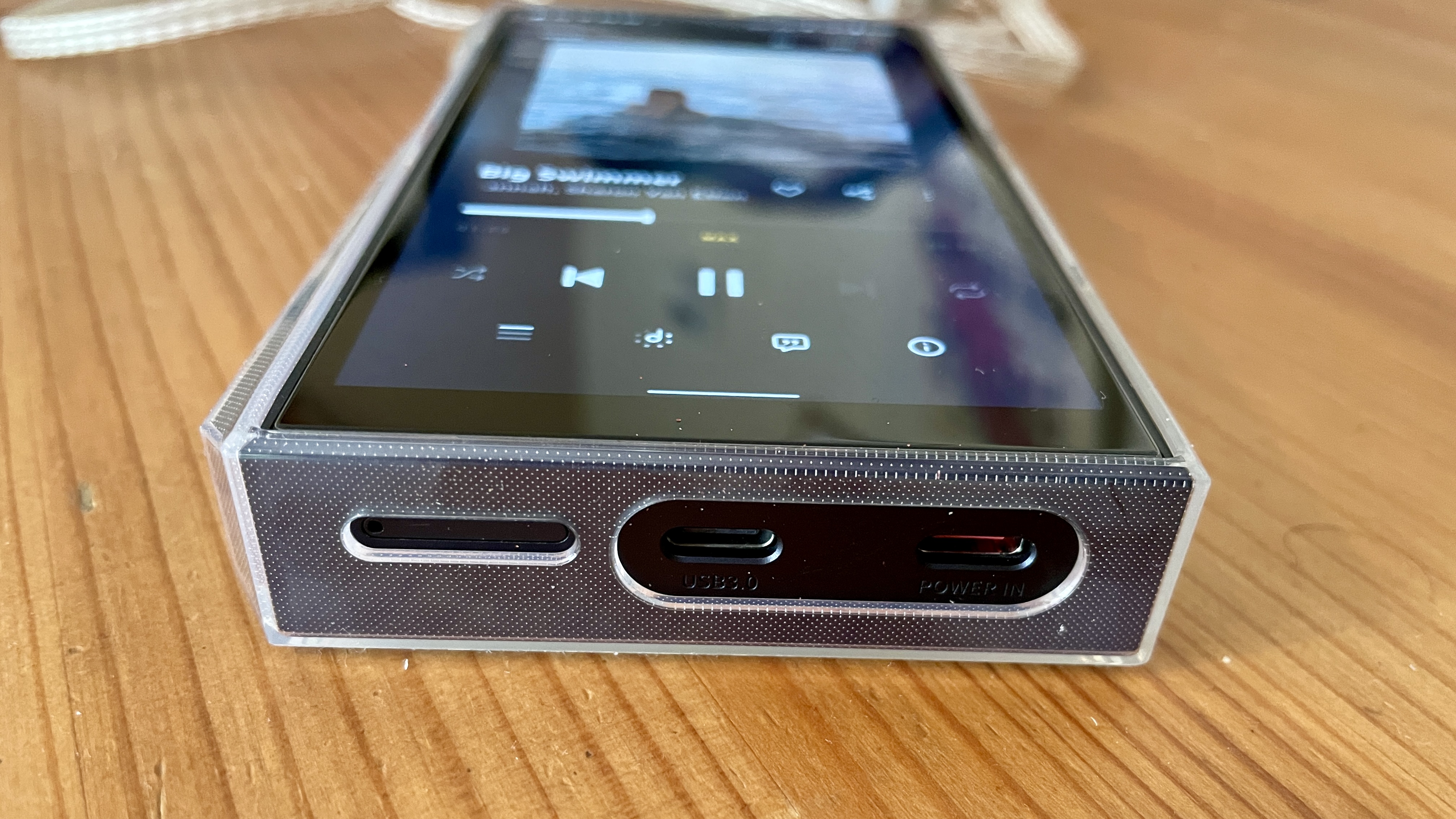 FiiO M23 on a wooden table