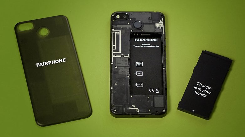 Fairphone 3 partially disassembled with the back panel and battery removed.