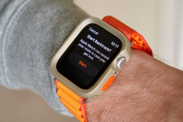 Apple Watch SE 2 with protective case and generic Alpine Loop-style strap.