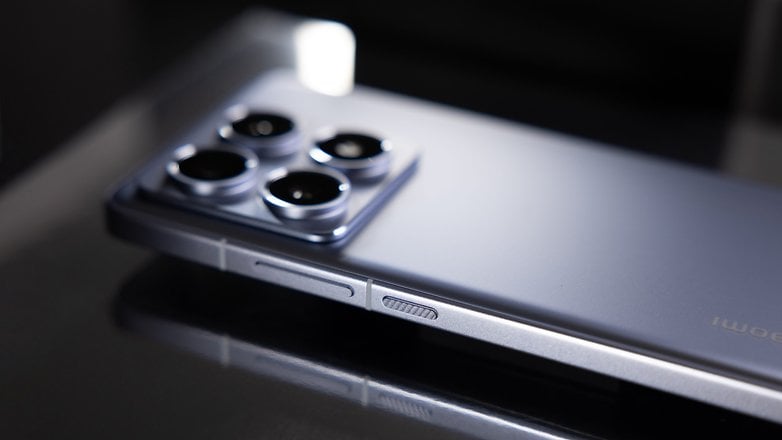 Close-up of a Xiaomi 14T Pro smartphone showing its camera layout and side buttons.