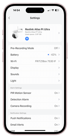 Settings menu for Reolink Atlas PT Ultra camera, showing battery, WiFi and alarm settings.