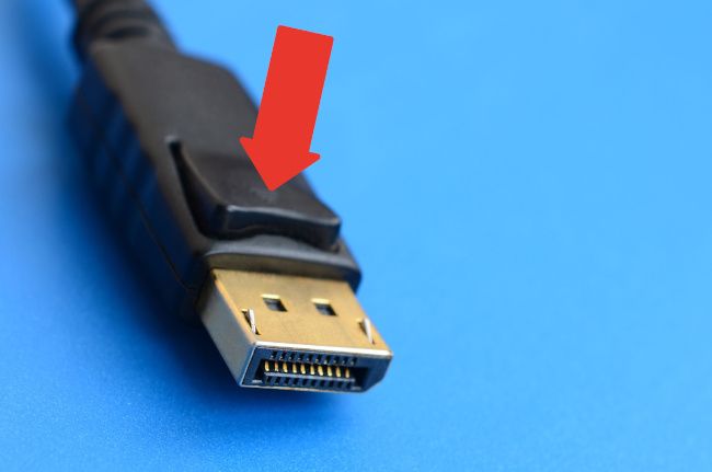 Press the release button on the DisplayPort cable connector.