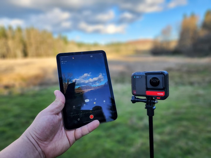 Insta360 One RS and iPad Mini with Insta360 app connected to the camera.