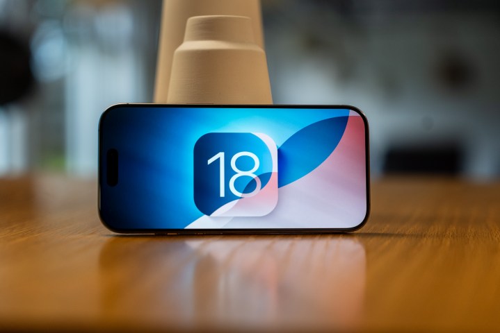 iOS 18 logo on the iPhone 16 Pro