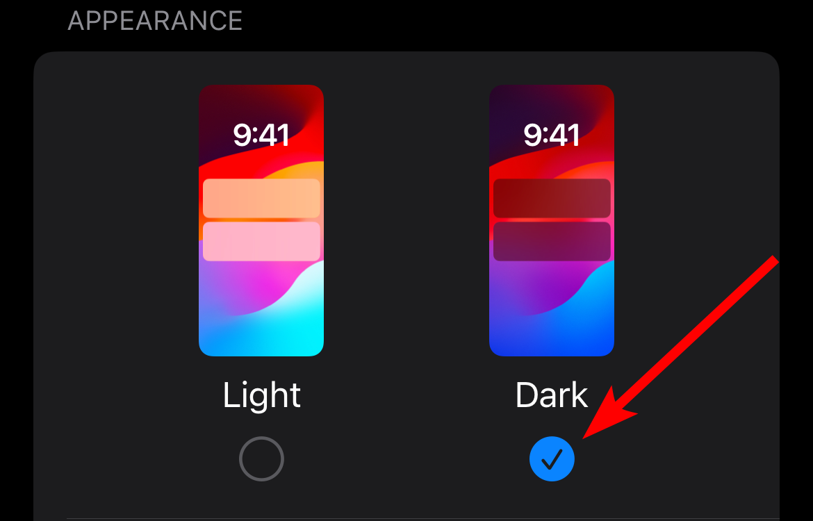 Setting the display settings to dark mode in iPhone settings.