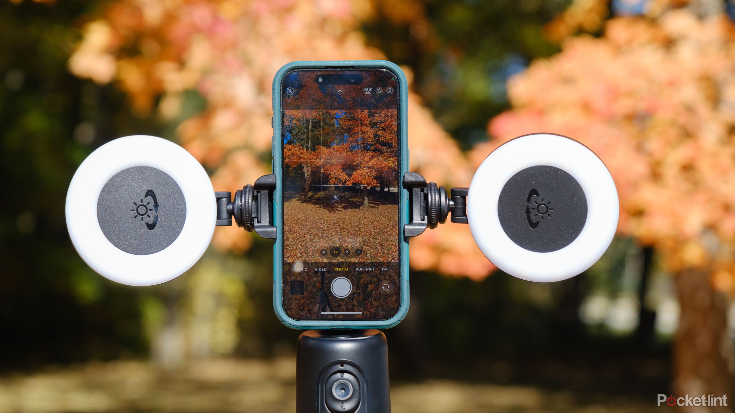 A photo of the SelfieShow Tracking Tripod with an iPhone