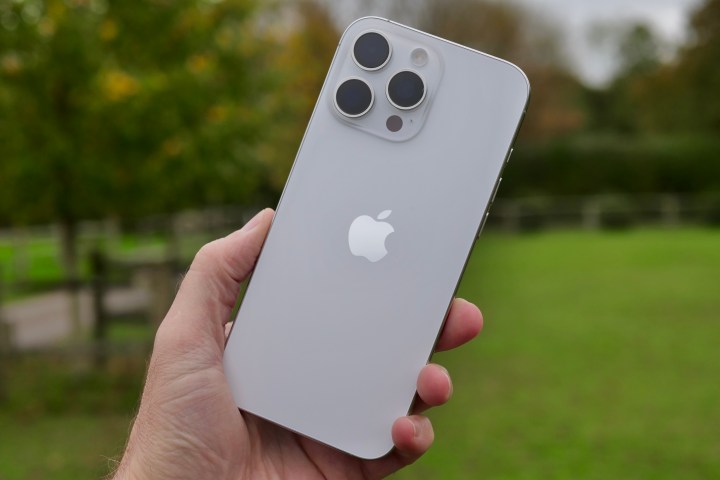 A person holding the Apple iPhone 16 Pro Max.