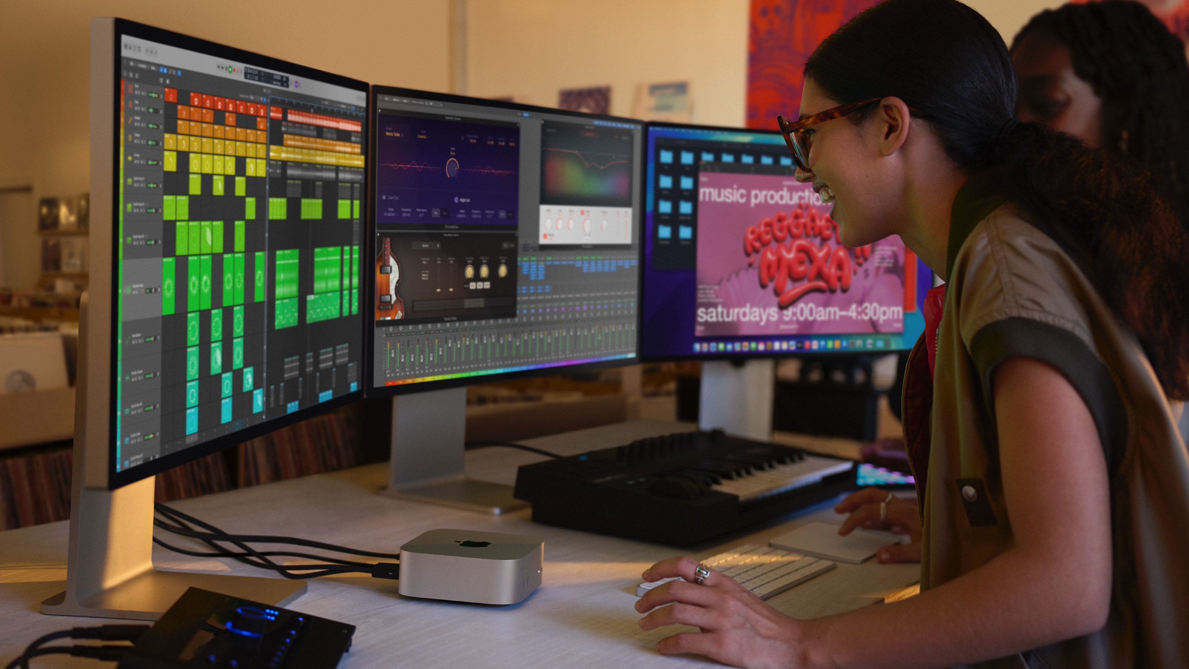 Someone using the M4 Mac Mini at a desk.