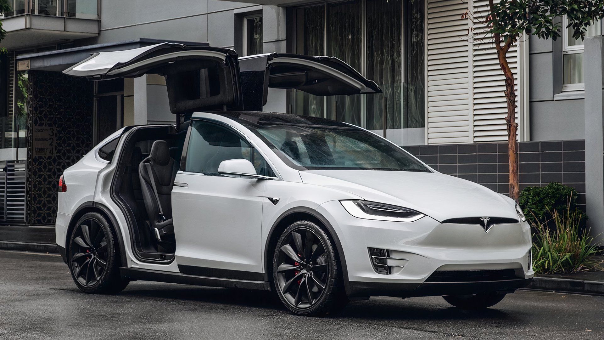 A 2019 Tesla Model X with its Falcon Wing Doors open