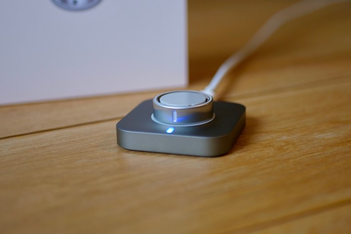 The Oura Ring 4 on charge.