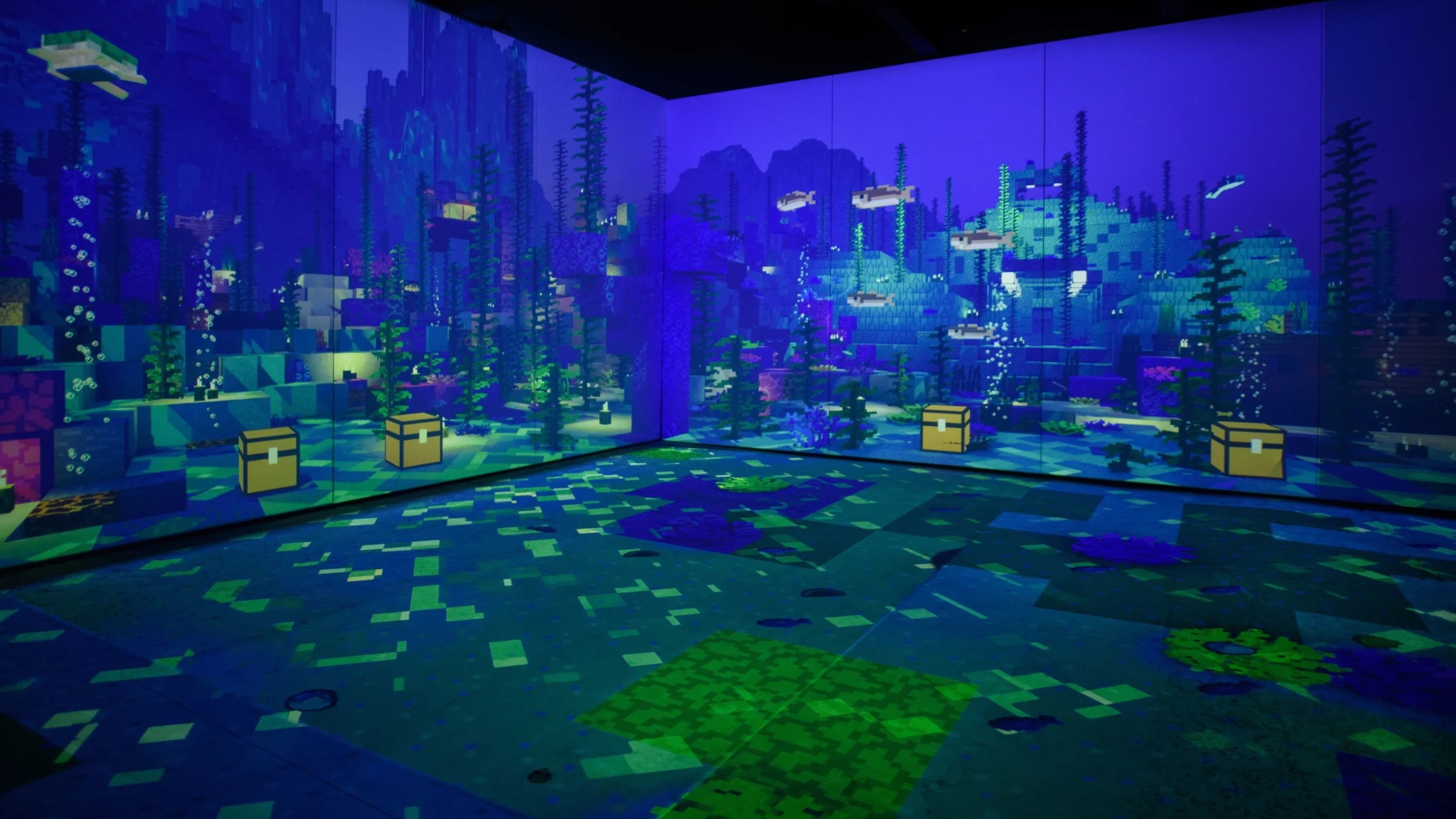 A wide shot of an underwater room with multiple chests.