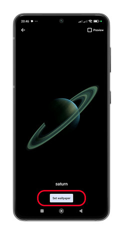 Xiaomi phone displaying Saturn wallpaper with 'Set wallpaper' button.