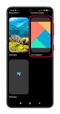 Xiaomi phone screen displaying wallpaper options, including seascapes and live wallpapers.