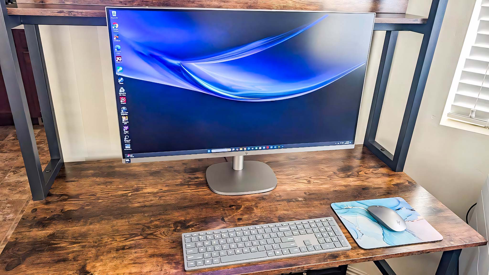 HP OmniStudio X AIO sitting on a desk.