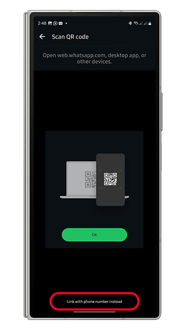 WhatsApp QR code scanning screen with instructions and option to link with phone number.