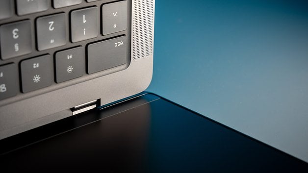 Close up of an Apple MacBook Pro M4 keyboard and side view.